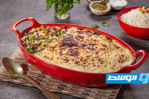 أرز بالجزر والبازلاء وصوص البشاميل